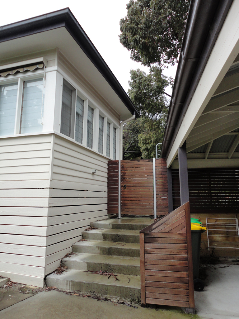 JB Construction Services Pty Ltd sloping site parking and outdoor living - carport, decking - steps to the yard photo